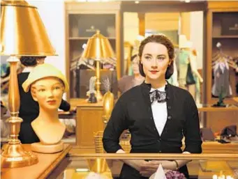  ?? Kerry Brown
Fox Searchligh­t ?? “BROOKLYN,” with Saoirse Ronan, above, was made after its producer secured $8 million of the $11-million budget with global co-production treaties.