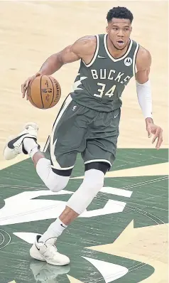  ?? AFP ?? The Bucks’ Giannis Antetokoun­mpo is doubtful for Game One against the Suns.