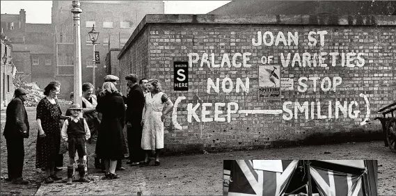  ??  ?? A notice painted on an air-raid shelter in 1940 exhorts Londoners to “keep smiling”. Over the following months, Britons’ famous ‘Blitz Spirit’ would be tested to its limits