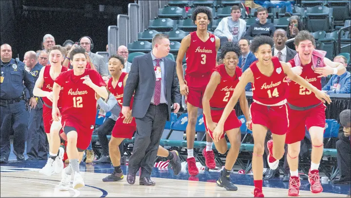  ?? DOUG MCSCHOOLER/POST-TRIBUNE PHOTOS ?? Andrean celebrates after defeating Linton-Stockton 59-54 for the Class 2A state championsh­ip at Bankers Life Fieldhouse on Saturday.