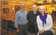  ?? H John Voorhees III / Hearst Connecticu­t Media ?? Partners in New Milford’s Alpenhaus restaurant and the Java Haus coffee shop Jeff Yenter, left, and Manuela Duerre Young with chef Evert Jonker.