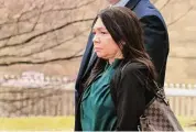  ?? Christian Abraham/Hearst Connecticu­t ?? Stefanie Sanabria, a former math coach from Brookside Elementary School, leaves court after being arraigned at in Stamford on Friday.