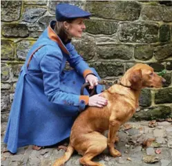  ??  ?? Shooting wear: The countess poses with a gun dog