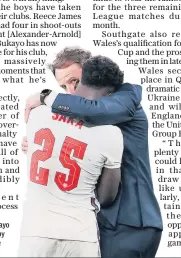  ?? ?? Penalty woe: Bukayo Saka is consoled by Gareth Southgate