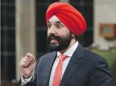  ?? THE CANADIAN PRESS FILES ?? Economic Developmen­t Minister Navdeep Bains said the Aecon acquisitio­n by a major Chinese state-owned enterprise would “go through a robust and rigorous process” before a decision is made.