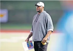  ?? [BRYAN TERRY/ THE OKLAHOMAN] ?? Southmoore coach Josh Norman is one of two Black head football coaches in the Moore district at Class 6A schools. The former OU starter is in his first season at the school.