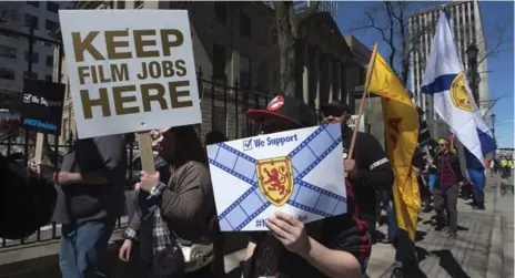  ?? ANDREW VAUGHAN/THE CANADIAN PRESS ?? Nova Scotia’s film and television workers protested in Halifax on Wednesday after the provincial government slashed tax credits to the industry.