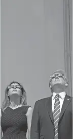  ??  ?? The Trumps view the solar eclipse from the White House on Aug. 21. SHAWN THEW/EUROPEAN PRESSPHOTO AGENCY