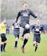  ??  ?? Bragging rights Gary Smith celebrates his third goal from a spectacula­r free kick