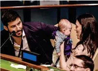  ?? AFP ?? NEW UN MEMBER: Jacinda Ardern, Prime Minister of New Zealand, made history when she brought her three-month-old daughter Neve Te Aroha Ardern Gayford and husband Clarke Gayford to the UN Assembly hall during the Nelson Mandela Peace Summit in New York on Monday. —