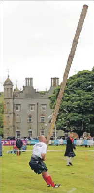  ??  ?? Ernie Weir tosses the caber.