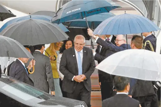  ??  ?? Prime Minister Scott Morrison arrives in Osaka for the G20 summit.