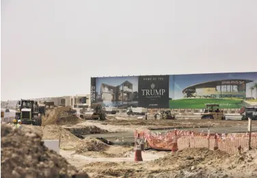  ??  ?? Top: Workers on an Al Arif bus that takes them to their 10-hour workdays in Dubai. At two new luxury developmen­ts, both with golf courses managed by the Trump company, migrant workers employed by a local contractor complain they are not paid on time....
