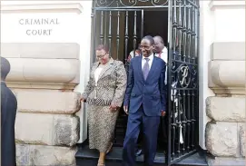 ??  ?? Dr Thokozani Khupe and her lawyer Professor Lovemore Madhuku walk out of the Constituti­onal Court in Harare yesterday