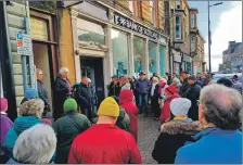  ?? ?? People gathered in force to witness the handing over of the petition in Dunoon. The town’s new banking hub has now been set up.