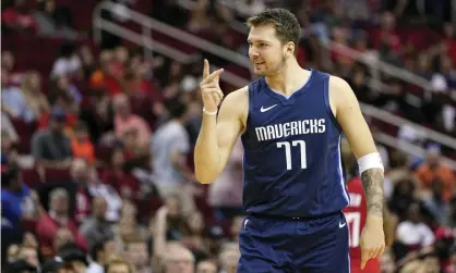  ?? Photograph: David J Phillip/AP ?? Luka Doncic has helped the Mavericks into a playoff place in the stacked Western Conference.