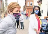  ??  ?? Up for the fight Nicola Sturgeon campaigns with SNP candidate Siobhian Brown