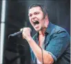  ?? MAY HARRIS/ THE ASSOCIATED PRESS ?? Frontman Rick DeJesus and Adelitas Way self-financed their upcoming new record after splitting from Virgin Records.