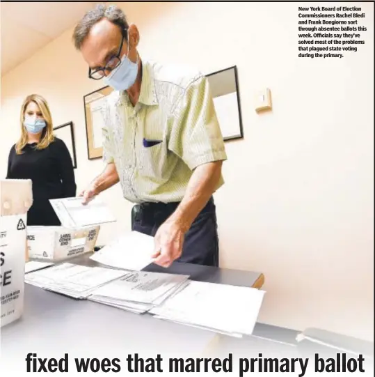  ??  ?? New York Board of Election Commission­ers Rachel Bledi and Frank Bongiorno sort through absentee ballots this week. Officials say they’ve solved most of the problems that plagued state voting during the primary.