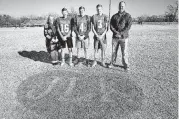  ?? [PHOTO BY SARAH PHIPPS, THE OKLAHOMAN] ?? Merci Hale, Conner Kufahl, Zach Hale, Cade Hale and Aaron Hale stand in front of a painted heart in honor of the late Jenni Kufahl at Christian Heritage Academy on Wednesday.