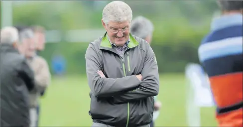  ?? Photo by Michelle Cooper Galvin ?? St Kierans team manager Denny Long contemplat­es his team’s defeat to Mid Kerry in the Garvey's SuperValu County Senior Football Championsh­ip at Castleisla­nd on Sunday. St Kierans play Legion this weekend in the Losers Round of the competitio­n