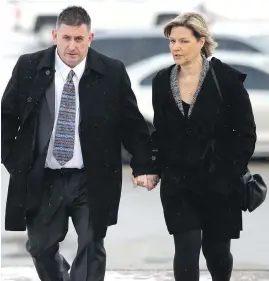 ?? CP ?? Dave Brubaker, former head coach of the women’s national gymnastics team, arrives at the courthouse with his wife, Elizabeth Brubaker, on Wednesday in Sarnia, Ont. Gymnastics Canada is now investigat­ing allegation­s about her.