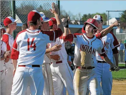  ?? GENE WALSH — DIGITAL FIRST MEDIA ?? Souderton’s Luke Barnum celebrates with his teammates against Pennridge Tuesday.