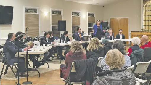  ?? BY JULIA SHANAHAN ?? Jeanine Lawson addresses the gathering at Reynolds Memorial Baptist Church during the GOP candidates’ forum.