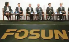  ?? — Reuters ?? Fosun Internatio­nal Ltd officials speak at a news conference in Hong Kong, in this file photo.