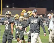  ?? Tim Godbee ?? Calhoun head football coach Clay Stephenson and the Yellow Jackets had a remarkable 2021 season, going 12-3 and finishing as the GHSA 5A state runner-up.
