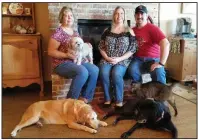  ?? Photos courtesy of Sherry Lopatic ?? Better together: Sherry Lopatic (left), pictured with her daughter and son-in-law, Rachel and Michael Tidwell, three of their five dogs — Kit, the yellow Lab; Sadie, the black Lab; Grace, the Shih Tzu — and Harley, the cat.