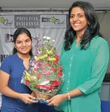  ??  ?? Grandmaste­r Harika Dronavalli (right) congratula­tes Pratyusha Bodda on becoming a Woman Internatio­nal Master at the Press Club of Hyderabad on Tuesday.