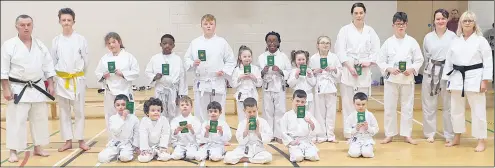  ?? ?? Congratula­tions to all the beginners from Mitchelsto­wn Karate Club who passed their grading under grading officer Sensei Eddie O’Donnell. Paddy Stapleton, Trevor O’Donnell, Tommy McGrath, Ciaran McGrath, Caroline McGrath, Izzie Kemp, Dylan Kennedy, Finn Kennedy, Jamie Sheehan, Jimmy Sheehy Riordan, Hannah McDonagh, Maggie McDonagh, Mollie Boland, Darren Farnell, John Kabundi and Vankina Kabundi.