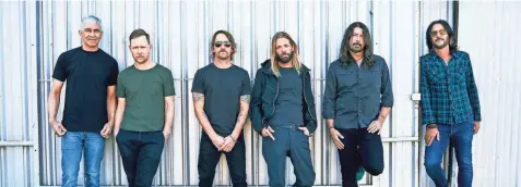  ?? DANNY CLINCH ?? Dave Grohl, second from right, and Foo Fighters celebrate their 25th year with “Medicine at Midnight.”