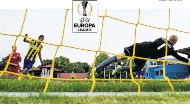  ??  ?? NET RESULT: Adam Rooney, left, on target for Aberdeen once again to score the only goal of the game against Ventspils in the Europa League second round qualifying round tie in Latvia on Thursday