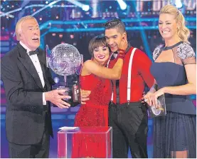  ??  ?? GLITTERING TURN: With Louis Smith and Flavia Cacace on Strictly, 2012
