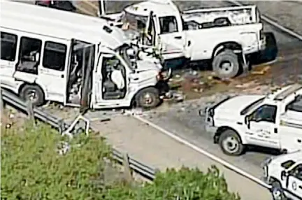  ?? PHOTO: REUTERS ?? A still image of aerial video shows an accident scene involving a Texas church bus carrying senior citizens which crashed head-on with another vehicle about 130km west of San Antonio, Texas.