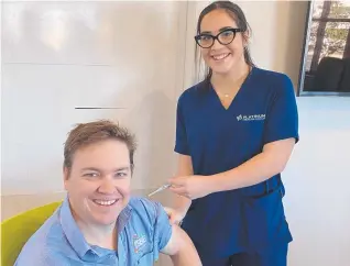  ?? Picture: Contribute­d ?? REDUCING RISK: TSBE Health general manager Jaden Frame getting his flu shot from Platinum Health Group's Indy Knopfler.