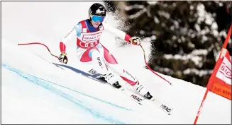  ??  ?? Switzerlan­d’s Lara Gut-Behrami speeds down the course during an alpine ski, women’s World Cup super-G, in Crans Montana, Switzerlan­d, Jan 24. (AP)