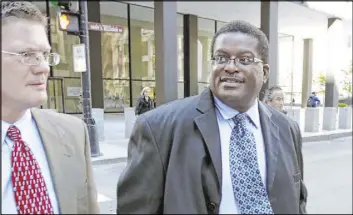  ?? Phil Velasquez The Associated Press file ?? Former Chicago Police Sgt. Ronald Watts, right, leaves the Dirksen U.S. Courthouse in October 2013 after being sentenced to 22 months in prison.