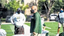  ?? Provided by Brandon Randall, CSU Athletics ?? Colorado State head coach Steve Addazio walks on the sidelines during the Rams’ first preseason practice in pads late last month.