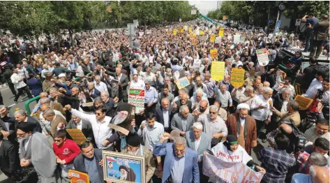  ?? — AFP ?? Iranians hold nationwide rallies to vent their anger at the US over its withdrawal from a 2015 nuclear deal.