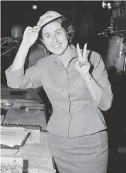  ?? Ed Widdis/Associated Press 1957 ?? City Council Member Rosalind Wyman, in an L.A. Bums cap, celebrates the team coming to the city.