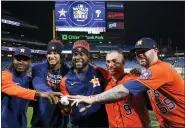  ?? AP PHOTO/MATT SLOCUM ?? Houston Astross relief pitcher Rafael Montero, relief pitcher Bryan Abreu, starting pitcher Cristian Javier, catcher Christian Vazquez, and relief pitcher Ryan Pressly, from left, celebrate a combined no hitter after Game 4 of baseball’s World Series between the Houston Astros and the Philadelph­ia Phillies on Wednesday, Nov. 2, 2022, in Philadelph­ia.