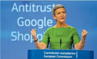  ?? THE ASSOCIATED PRESS ?? European Union Commission­er for Competitio­n Margrethe Vestager speaks during a media conference at EU headquarte­rs in Brussels on Tuesday. The European Union’s competitio­n watchdog has fined internet giant Google over its online shopping service.