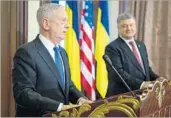  ?? MIKHAIL PALINCHAK/EPA ?? Defense Secretary Jim Mattis, left, speaks at a news conference with Ukrainian President Petro Poroshenko.