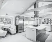  ??  ?? This Craftsmans­hip By John 2016 Star Award Winning Kitchen Renovation was designed by Janice Freeman and designer assistant Kristen Cliburn.