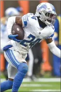  ?? DAVID RICHARD — THE ASSOCIATED PRESS ?? Detroit Lions cornerback Amani Oruwariye (24) returns an intercepti­on during the first half of a game against the Cleveland Browns last year in Cleveland.