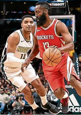  ?? —USA TODAY SPORTS ?? Houston Rockets’ James Harden tries to get past Denver Nuggets’ Gary Harris at Pepsi Center.