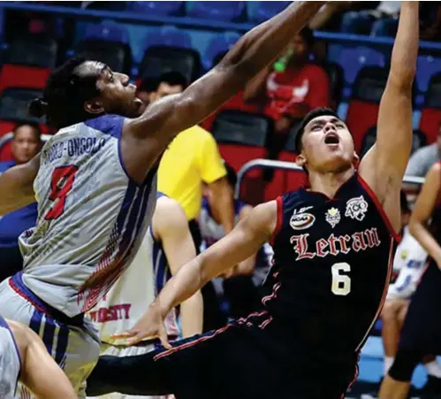  ??  ?? LETRAN'S Rey Nambatac (6) attempts a lay-up against the defense of Arellano's Eli Ongolo Ongolo. A L/ ABS-CBN Sports